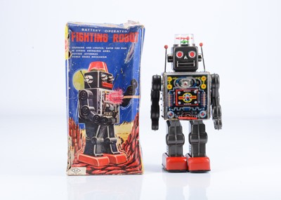 Lot 409 - A Japanese Horikawa (S.H) Tinplate Battery-Operated Fighting Robot
