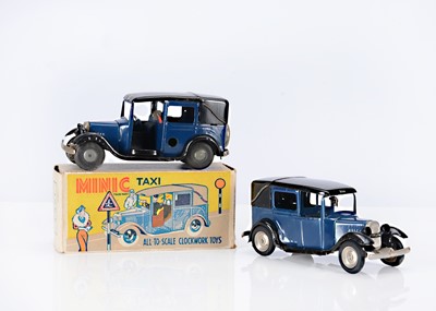 Lot 522 - Tri-ang Minic Tinplate Clockwork 35M Post-War Taxi Cabs