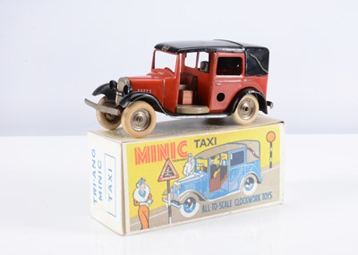 Lot 539 - A Tri-ang Minic Tinplate Clockwork 39M Pre-War Taxi Cab