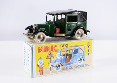 Lot 540 - A Tri-ang Minic Tinplate Clockwork 39M Pre-War Taxi Cab