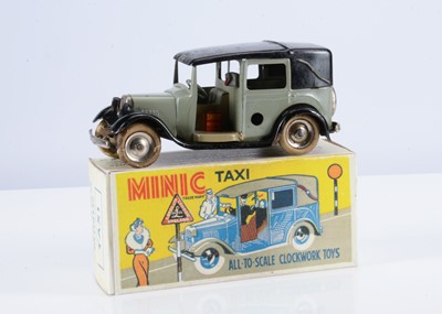 Lot 541 - A Tri-ang Minic Tinplate Clockwork 39M Pre-War Taxi Cab