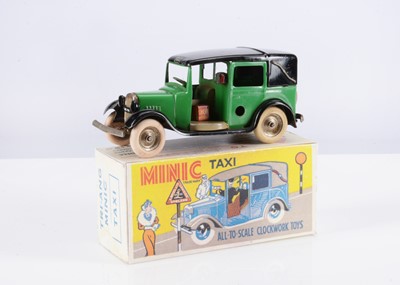 Lot 542 - A Tri-ang Minic Tinplate Clockwork 39M Pre-War Taxi Cab