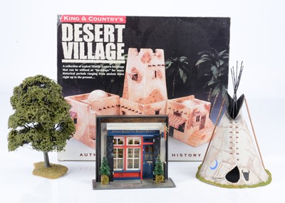 Lot 727 - Buildings and accessories by various makers including John Gittins Models, and King & Country comprising Under Two Flags, London, shop front by unknown maker