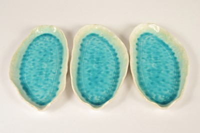 Lot 2 - A set of three ovoid stoneware turquoise glazed serving dishes