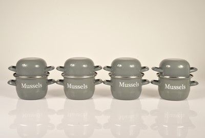 Lot 6 - A set of four enamel Mussel pots and covers