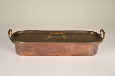 Lot 7 - A 19th Century copper twin handled fish kettle