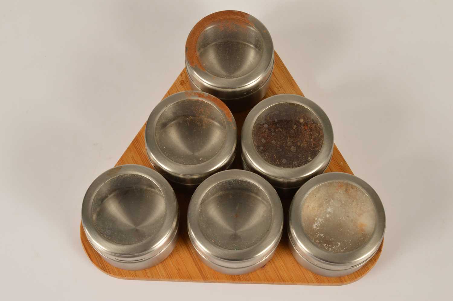 Lot 8 - A triangular six division magnetic spice rack