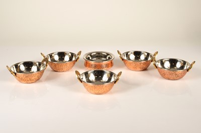 Lot 9 - Five twin handled copper and stainless steel curry bowls