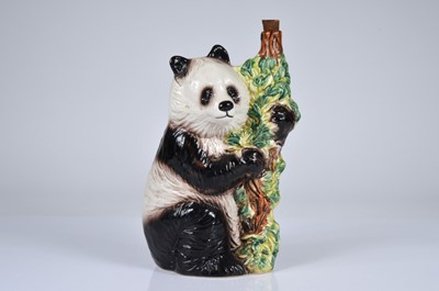 Lot 24 - A continental novelty pottery panda flask