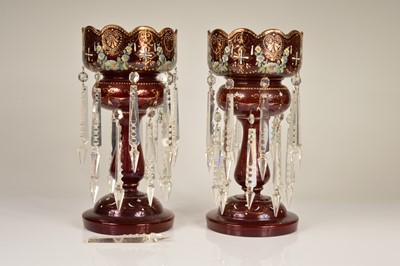 Lot 27 - A pair of 19th Century cranberry glass lustres