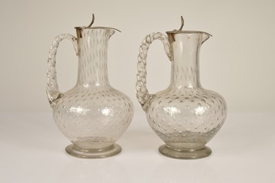 Lot 37 - A pair of 19th Century hand blown claret jugs