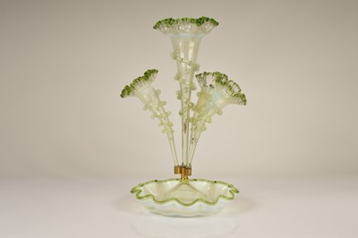 Lot 38 - A late 19th century Vaseline and green glass epergne