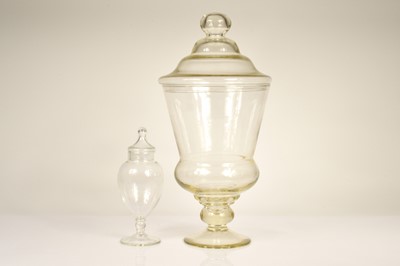 Lot 42 - Two contemporary glass vases and covers