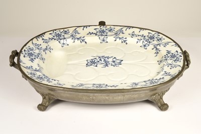 Lot 52 - A large Victorian pewter base twin handled blue and white decorated meat platter