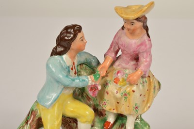 Lot 70 - A 19th century Staffordshire figure of a courting couple