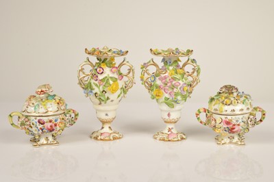 Lot 75 - A pair of mid 19th century Staffordshire porcelain vases