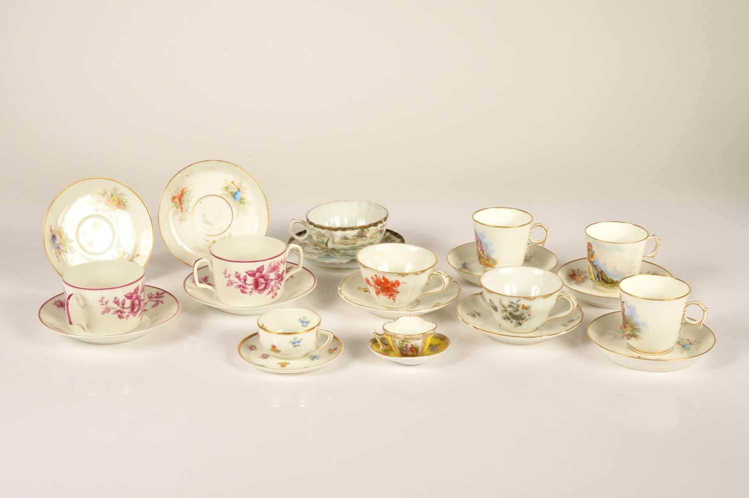 Lot 82 - A collection of continental porcelain tea cups and saucers