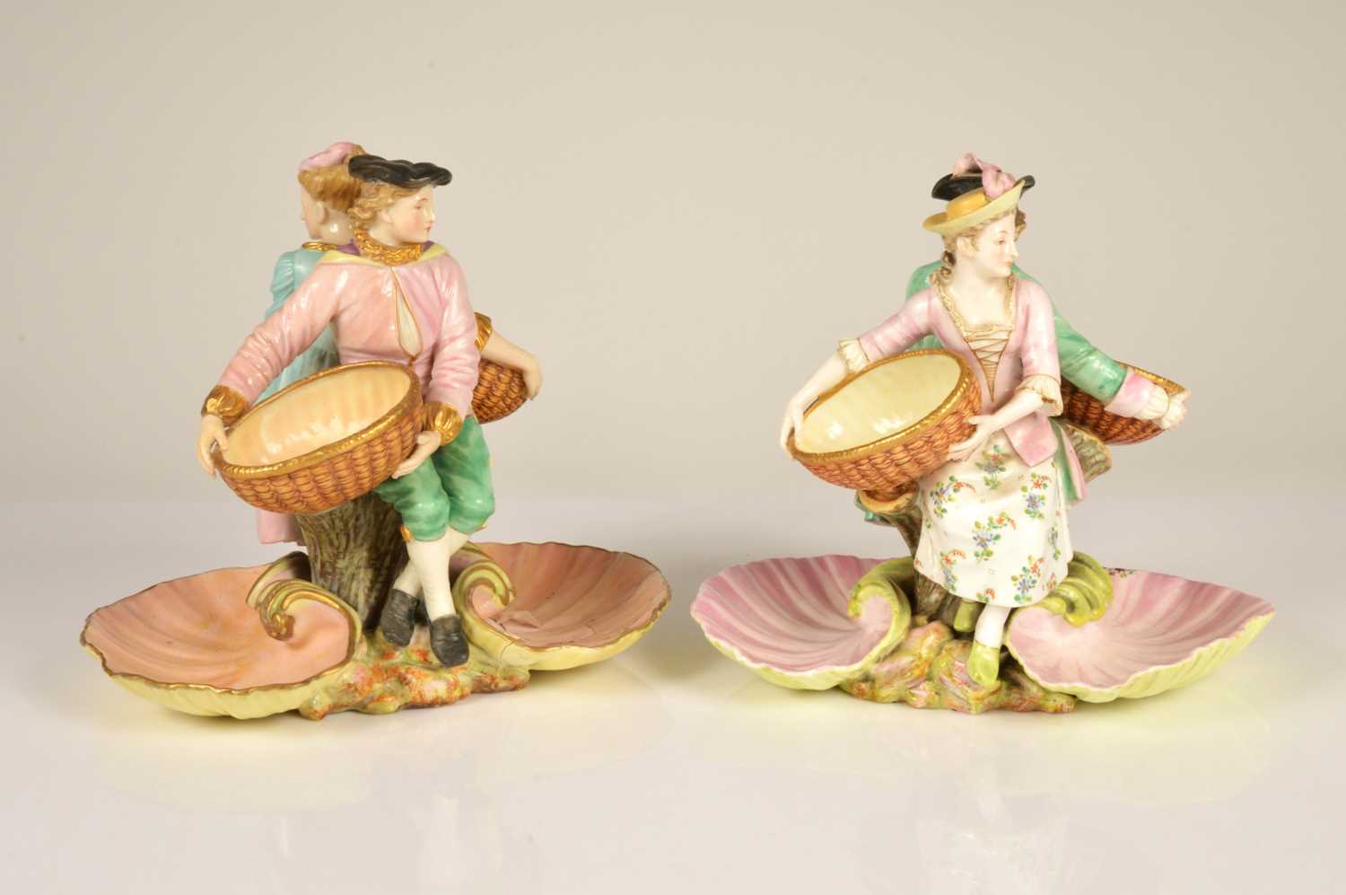 Lot 89 - A pair of Royal Worcester figurine groups 