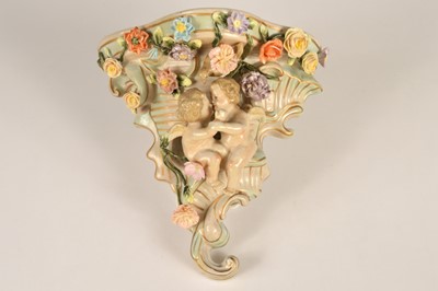Lot 96 - A contemporary continental porcelain wall mounted vase