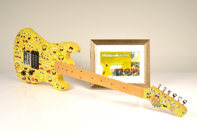 Lot 104 - A signed SpongeBob square pants fender six string Guitar
