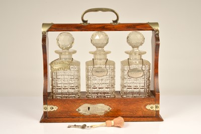Lot 139 - A presentation oak and silver plated tantalus