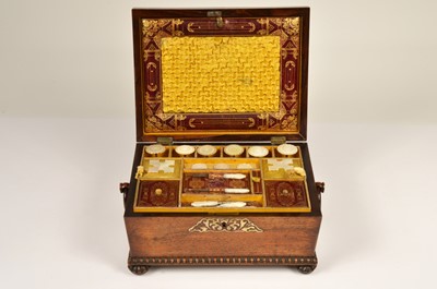 Lot 144 - A 19th Century mahogany sarcophagus shaped workbox