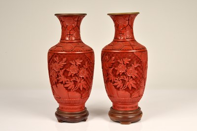 Lot 154 - A pair of Chinese cinnabar lacquerware  vases