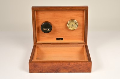 Lot 155 - A birdseye walnut and cedar lined boutique 22 Paris humidor