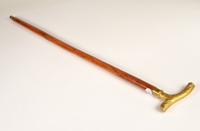Lot 220 - A contemporary tapered teak and brass travelling walking stick