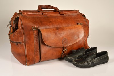 Lot 261 - A tan leather overnight holdall