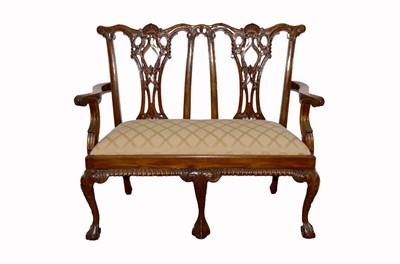 Lot 292 - A contemporary Chippendale style two seater settee