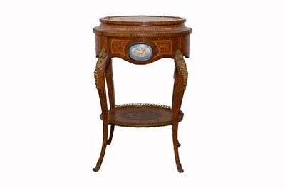 Lot 293 - A late 19th Century continental two tier work table