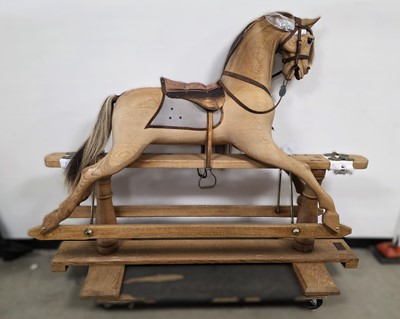 Lot 300 - A Stevenson Brothers England oak rocking horse