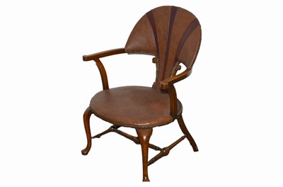 Lot 302 - An art deco upholstered oak framed armchair