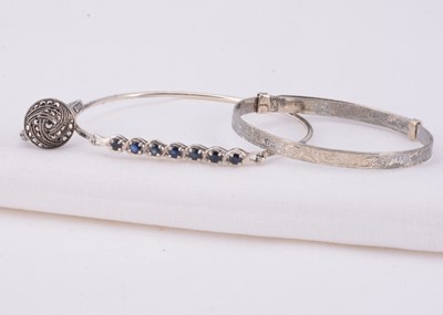 Lot 3 - A silver christening bangle, gem set bangle & ring
