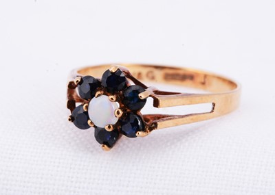 Lot 5 - A 9ct gold sapphire & opal dress ring