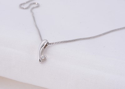 Lot 9 - A white metal drop pendant & chain