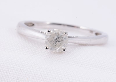 Lot 14 - A 9ct gold solitaire diamond set ring