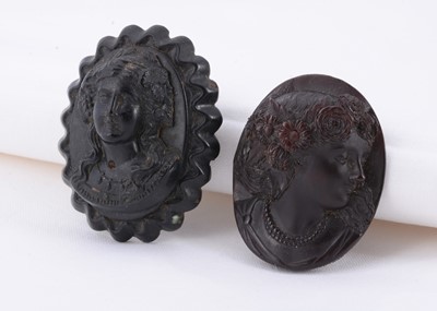 Lot 26 - An antique jet cameo brooch