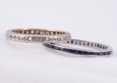Lot 31 - Two full eternity gem set rings