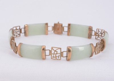 Lot 54 - A 9ct & Jadite Jade gold link oriental character bracelet
