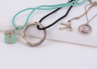 Lot 57 - Four "Tiffany & Co" marked pendants necklaces