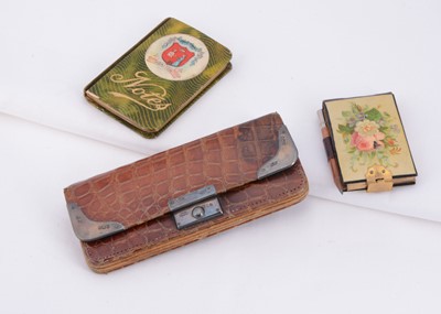 Lot 75 - An Edwardian Silver Mounted Leather Purse together with two note books