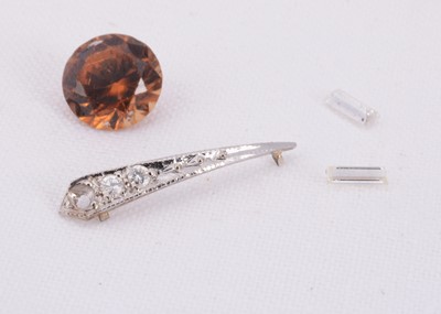 Lot 77 - A loose 3ct brown zircon & two baguette cut diamonds
