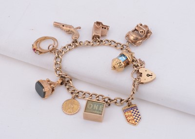 Lot 112 - A 9ct gold charm bracelet