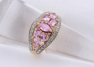 Lot 113 - A 9ct gold marquise pink sapphires & pave set diamond dress ring