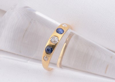 Lot 124 - An Victorian 18ct gold sapphire & diamond gypsy set ring
