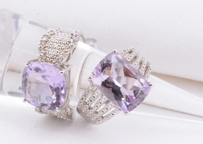 Lot 125 - Two silver rose de France amethyst dress rings