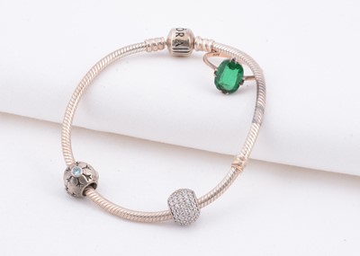 Lot 126 - A 9ct gold green paste ring & pandora silver charm bracelet