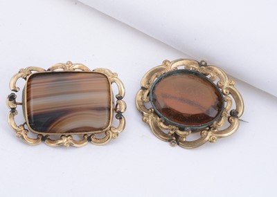 Lot 144 - Two antique pinchbeck brooches